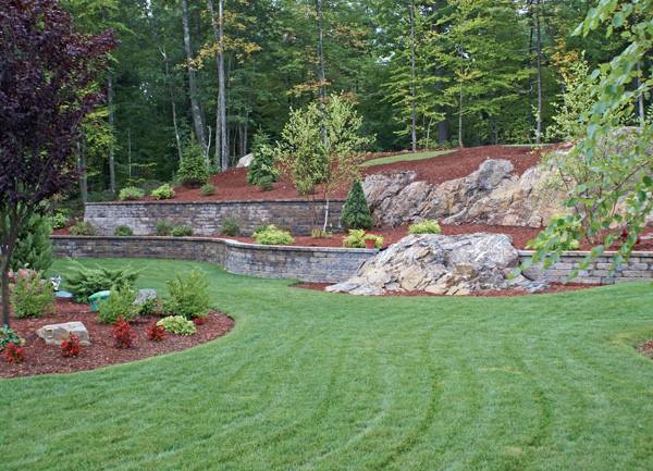 Crew installing a flagstone walkway at a residential property