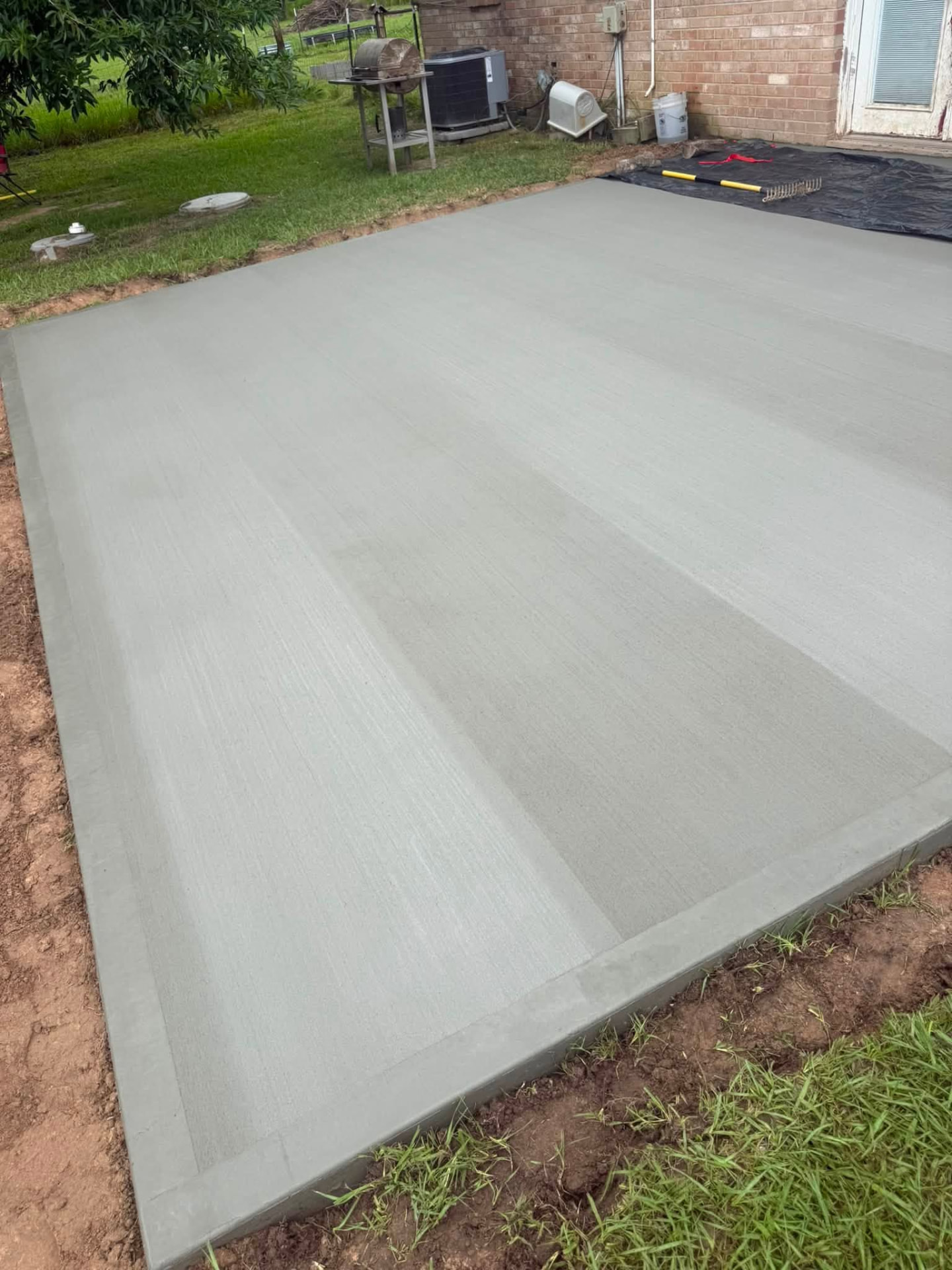 Broom-finished concrete slab with clean control joints