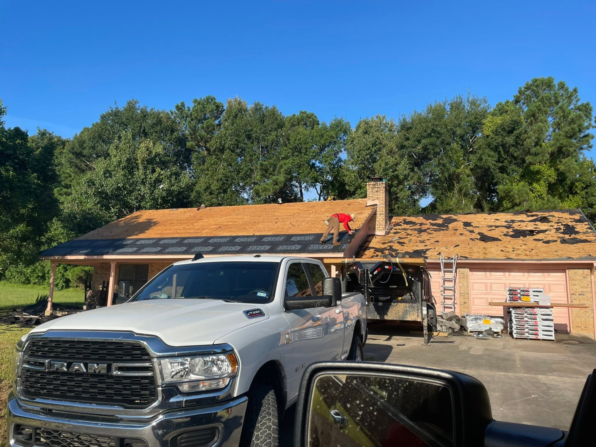 Roof stripped to bare decking during a Blackwell tear-off